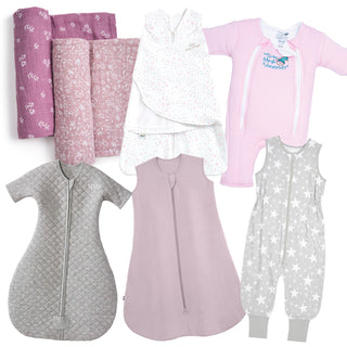 A collection of baby sleepwear and blankets including pink and gray swaddles, sleep sacks, a pink romper, a gray zippered suit, and gray star-patterned pajamas.