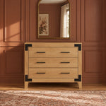 Lucas Dresser in Nutmeg, a three-drawer modern farmhouse dresser in wood with black metal corner accents and handles.