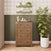 The Child Craft Atwood 4-Drawer Chest in Cocoa Bean is a dark wood four-drawer chest for a modern nursery, featuring chevron detailing on the top drawer front and dark hardware.