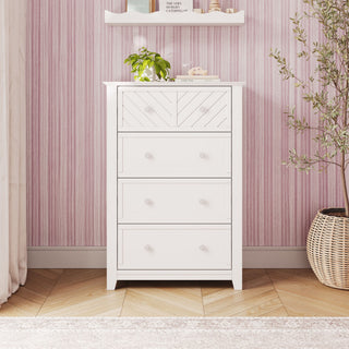 Matte white Atwood 4-Drawer Chest for a modern nursery, featuring chevron detailing on the top drawer and small hexagonal knobs.
