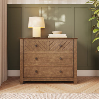Child Craft Atwood 3-Drawer Dresser in Cocoa Bean, featuring a dark brown finish and geometric carved detailing on the top drawer, perfect for a baby nursery.