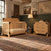 Child Craft Lucas 2-Piece Nursery Set with a rustic wooden crib and a three-drawer dresser with black corner hardware, placed in a room with an ornate rug.