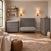 A matching gray baby nursery furniture set featuring a crib, a changing table with drawers, and an Atwood 4-Drawer Chest, Lunar Gray.