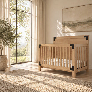 Child Craft Lucas 4-in-1 Convertible Crib in Nutmeg, a 4-in-1 convertible wooden crib featuring modern farmhouse styling with black corner accents.