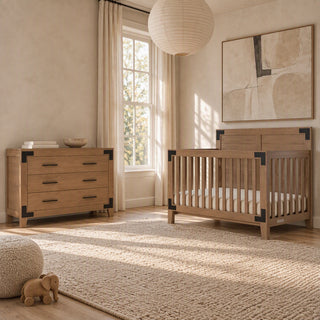 A Dusty Heather Child Craft Lucas 4-in-1 Convertible Crib and a matching three-drawer dresser with black metal corner accents in a modern farmhouse nursery.