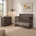 A dark gray Child Craft crib and matching Redmond 3 Drawer Dresser in a bedroom.