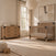 Child Craft Lucas 2-Piece Nursery Set with Crib and Dresser featuring a shiplap headboard and a three-drawer dresser, both with dark metal corner accents, in a modern farmhouse nursery.