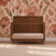 A Child Craft Surrey Hill 4-in-1 Convertible Crib in toasted chestnut, featuring a slatted wooden design and a rectangular backboard.