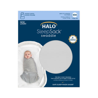 A package of HALO Swaddle Micro-Fleece TOG 3.0 shows a baby in a gray swaddle. The blue packaging highlights its micro-fleece material, is labeled for newborns (birth–3 months), and displays the HALO logo and key features.