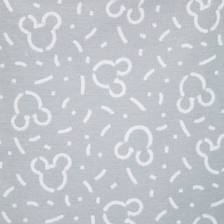 The Disney™ 100% Cotton Swaddle TOG 1.5 by HALO features light gray fabric with playful white Mickey Mouse head outlines and scattered dashed lines—a cozy, safe sleep wearable blanket for your baby.