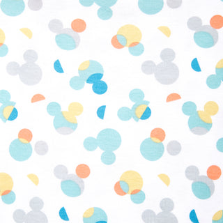 Abstract Mickey Mouse head shapes in pastel blue, orange, yellow, and gray overlap on a white background—perfect for the Disney™ Wearable Blanket Cotton TOG 0.5 by HALO to support safe sleep for babies.