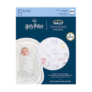 The Harry Potter™ Swaddle 100% Cotton TOG 1.5 by HALO features a baby wrapped snugly, highlighting size and material details with Safe Sleep Made Easier branding. Enchanting imagery ensures a cozy, magical sleep experience.