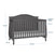 The Child Craft Camden 4-in-1 Convertible Crib in Cool Grey has slatted sides, a curved back, and measures 44.25