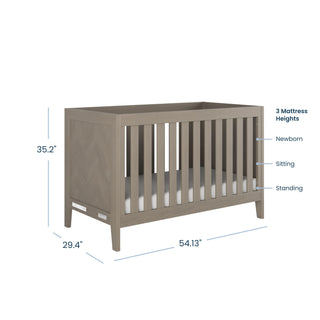 The Child Craft Kieran 3-in-1 Convertible Crib in Crescent Gray is shown with labeled dimensions: 35.2" tall, 29.4" wide, and 54.13" long, plus annotations for mattress heights: newborn, sitting, and standing.