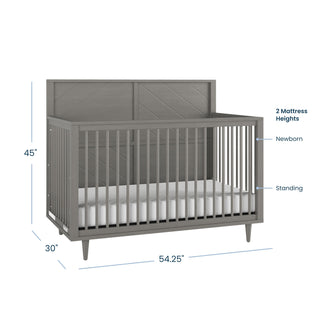 The Child Craft Surrey Hill 4-in-1 Convertible Crib in Lunar Gray features a high back panel, slatted sides, two mattress heights, and measures 45"H x 30"D x 54.25"W—perfect nursery furniture for newborns and standing babies.
