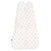 The HALO Swaddle 100% Cotton TOG 1.5 in white features light blue floral patterns on soft fabric, with adjustable wings for a snug fit and promotes healthy hip development. The widened bottom ensures comfort, and theres a small tag on the left edge.