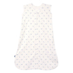 The HALO Wearable Blanket is a 100% cotton, TOG 0.5 sleeveless sleep sack with a front zipper and light background, adorned with a breathable pattern of small blue flowers for safe and stylish sleep.