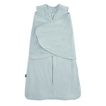 The HALO Swaddle SuperSoft Bamboo TOG 2.0 features a light blue design with a front zipper and adjustable Velcro wings, keeping infants snug and secure while sleeping.