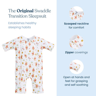 The HALO Disney® Winnie the Pooh Baby Merlin’s Magic Sleepsuit® 100% Cotton is displayed, featuring a white design adorned with colorful Winnie the Pooh prints. Details include a gently scooped neckline, zipper covers, and open hands and feet to promote self-soothing and grasping—perfect for babies transitioning from swaddling. The product emphasizes healthy sleep habits inspired by the original Magic Sleepsuit approach.