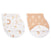 Aden + anais boutique 100% cotton muslin burpy bibs offer style and practicality, featuring one bib with rainbows on white and another with circles on light brown. Both provide full coverage with folded sections for convenience and charm.