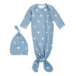 The aden + anais comfort knit™ newborn gown + hat gift set features a calming baby blue color with a white crescent moon pattern. The cotton-rich, long-sleeved gown has a knotted bottom, and the matching infant hat is styled with a top knot.