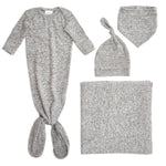 The aden + anais snuggle knit™ newborn gift set includes a gray marled knotted gown, knotted baby hat, square swaddle blanket, and bib, beautifully displayed on a white background.