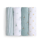 The aden + anais organic cotton muslin swaddle blanket 4 pack features designs arranged vertically: green and white stripes, sailboats on white, teal with sailboats, and yellow suns on white.