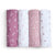 The aden + anais organic cotton muslin swaddle blanket 4 pack features GOTS certified colors: purple, white with small pink flowers, dusty rose with a leafy design, and white with pink and green dots.
