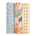 The aden + anais boutique silky soft swaddle blanket 3 pack includes a blue leaf pattern, a colorful floral design on ultra-smooth bamboo-infused viscose, and yellow dots on a silky soft white background.