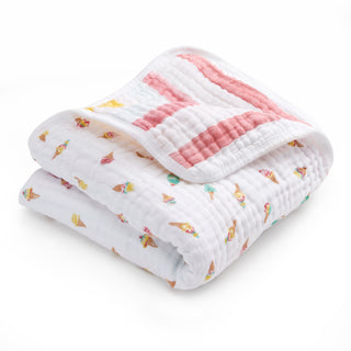 The aden + anais essentials cotton muslin dream blanket is a soft, white baby blanket featuring colorful ice cream cone prints and pink stripes, perfect for your little one.