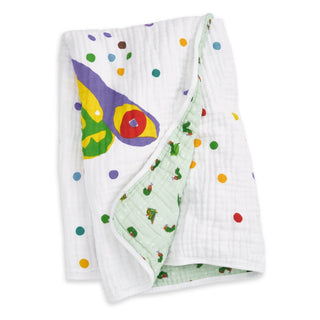 The aden + anais essentials cotton muslin dream blanket features colorful polka dots and a partial caterpillar design on one side, with a green reverse adorned with cute caterpillars—perfect for your little one.