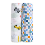 The aden + anais essentials cotton muslin swaddle blanket 2 pack includes one with cars and trees in soft hues and another with a blue, orange, green, and white checkered design.