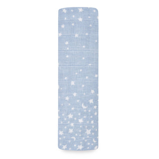 The aden + anais boutique 100% cotton muslin swaddle blanket features a rectangular design in blue with white stars and crescent moons, reminiscent of cozy yoga mats. Its textured appearance stands out elegantly against a white background.