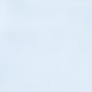 A light blue cotton muslin with a plain texture from aden + anais, displaying shade variations like a soft sky or abstract pattern, reminiscent of the softness and quality of their essentials changing pad cover.