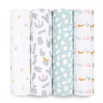 Four vertically rolled aden + anais essentials cotton muslin swaddle blankets showcase: multicolored alphabets, abstract gray shapes with little animals, a turquoise pattern with white designs, and pastel-colored scenic animals—all crafted from breathable cotton muslin.