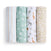 Four aden + anais cotton muslin swaddle blankets from the Essentials 4-pack are shown vertically: pastel stripes, green with white florals, white with safari animals, and white with mustard polka dots—all in soft muslin.