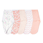 Five aden + anais essentials wrap swaddles quick change 5 pack blankets are displayed side by side, featuring soft floral prints, tiny hearts, and solid pastel shades in white, pink, and peach for safer sleep.