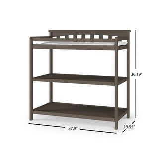 The Child Craft Flat Top Baby Changing Table in Dapper Gray features a baby changing pad, raised back and sides, two open nursery storage shelves, and measures 36.19" H x 37.9" W x 19.55" D.