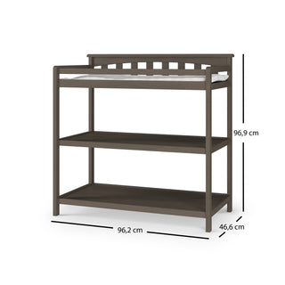 The Child Craft Flat Top Baby Changing Table in Dapper Gray features two open shelves for nursery storage and measures 96.2 cm wide, 46.6 cm deep, and 96.9 cm high. A thin baby changing pad on top adds comfort for your little one.