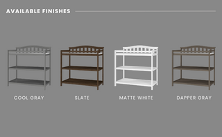 The Child Craft Arch Top Baby Changing Table in Matte White is shown with two storage shelves and a slatted back, displayed against a gray background.
