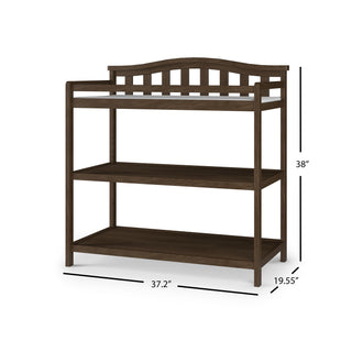 The Child Craft Arch Top Baby Changing Table in Slate features a decorative rail, two open storage shelves, and measures 38" high, 37.2" wide, and 19.55" deep—a stylish, functional addition to any nursery.