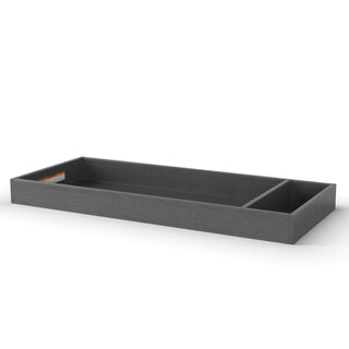 The Child Craft F01792 Universal Changing Table Topper in Midnight Gray is a rectangular wooden organizer with two compartments, ideal for use inside a dresser or paired with a changing table topper. Displayed on a white background.