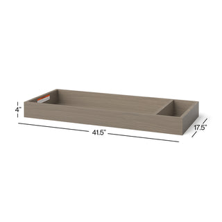The Child Craft F01792 Universal Dressing Kit in Crescent Grey is a rectangular wooden topper (4"H x 41.5"W x 17.5"D) featuring a partition for two sections, perfect for organizing your baby changing essentials.