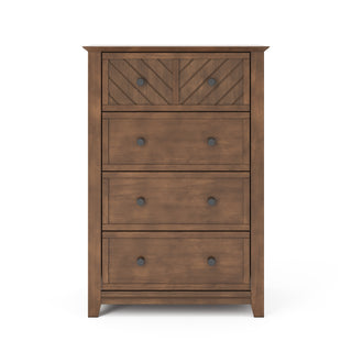The Child Craft Atwood 4-Drawer Chest in Cocoa Bean features four drawers, with stylish top chevron-patterned drawers and larger plain bottoms, each with two round dark knobs. The chest stands on short legs.