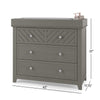 A Child Craft F01792 Universal Changing Table Topper in Lunar Gray sits atop a dresser with 2 small, geometric-patterned top drawers, 2 large lower drawers, and silver knobs. Dimensions: 42"W x 17.75"D x 37"H. Bottles rest on the topper.