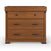The Child Craft Redmond 3 Drawer Dresser in Coach Cherry features two small upper drawers with round black knobs, a large lower drawer with black handles, a honey-brown cherry finish, and a raised edge on the top surface.