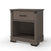 The Child Craft Redmond Nightstand in Dapper Gray features a single drawer, open lower shelf, and black metal accents on the corners and handle, shown against a white background.