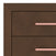 Close-up of the Child Craft Kieran 6-Drawer Double Dresser in Toasted Chestnut shows the herringbone corner detail and two drawers, each featuring a long, horizontal pink handle.