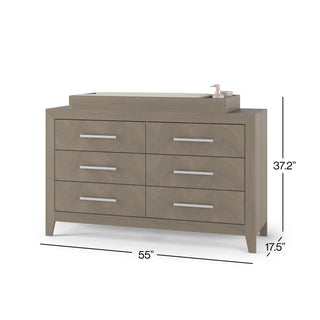 The Child Craft F01792 Universal Dressing Kit in Crescent Grey easily fits a six-drawer wooden dresser (55"W x 37.2"H x 17.5"D), letting you add a changing topper for convenience.