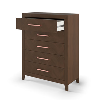 The Child Craft Kieran 5-Drawer Chest in Toasted Chestnut features five drawers with horizontal pink handles. The top drawer is open, showing folded white clothes inside, and the chest stands on short legs.